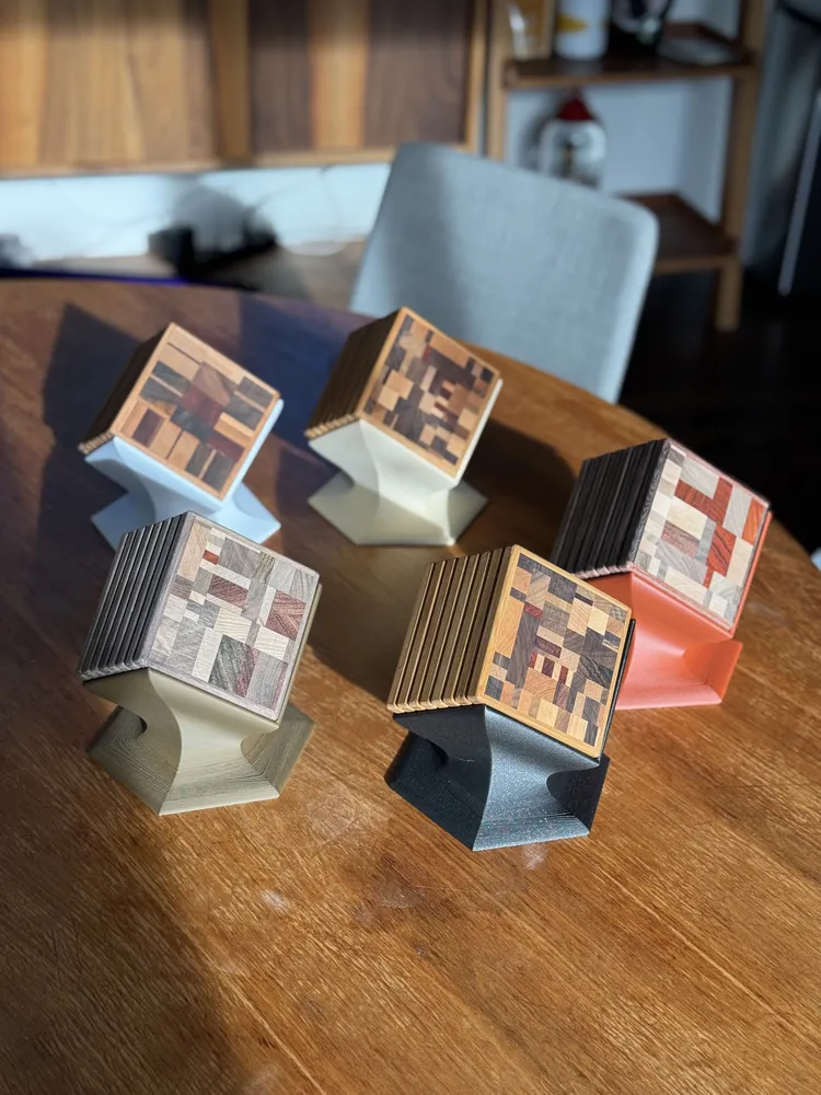 Set of mosaic wood coasters on printed display stands