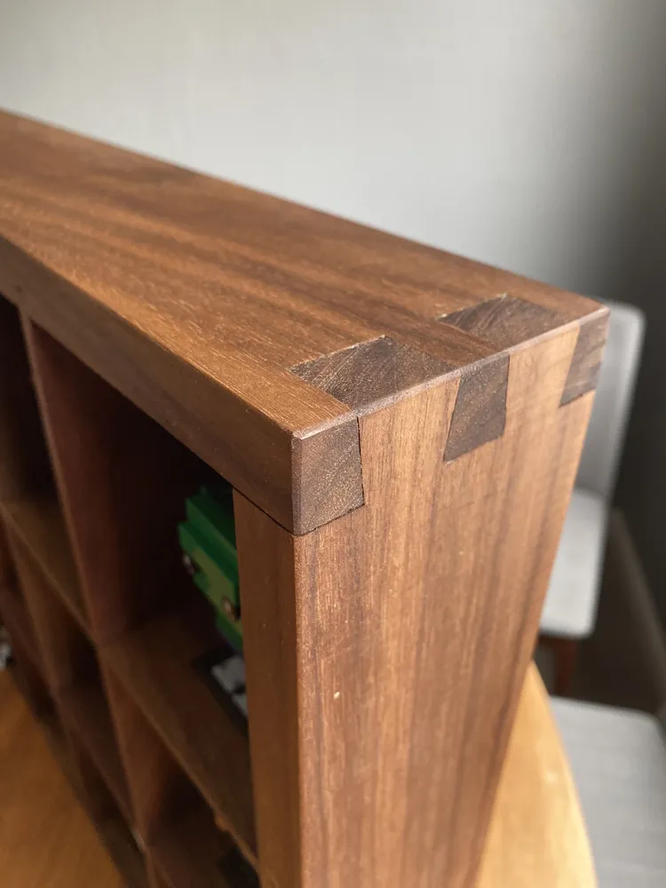 Close-up of the shadow box's dovetailed corner joinery
